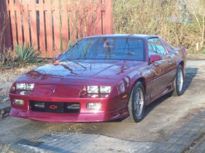 Photo of a maroon third-generation Chevrolet Camaro